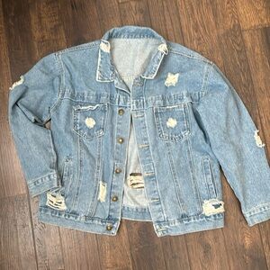 Distressed Jean jacket, front pocket tear